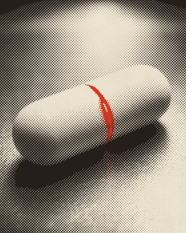 A capsule on a steel tray